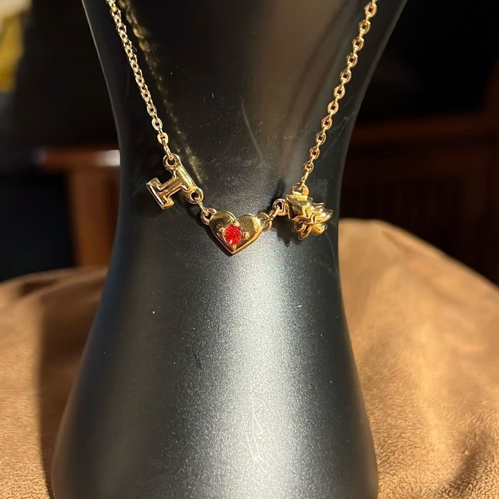 Avon “I love Christmas” faux gold ankle bracelet.